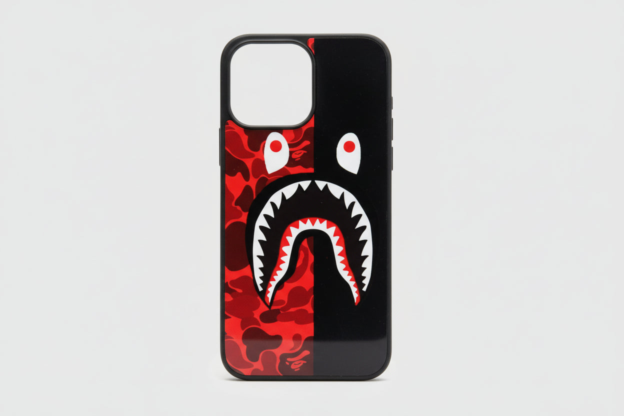 Phone case with a red and black shark design on a screen background