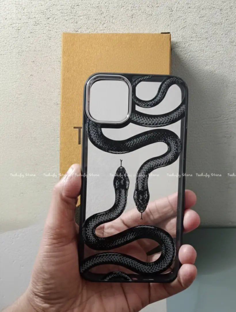Phone case with snake design held by a hand against a neutral background